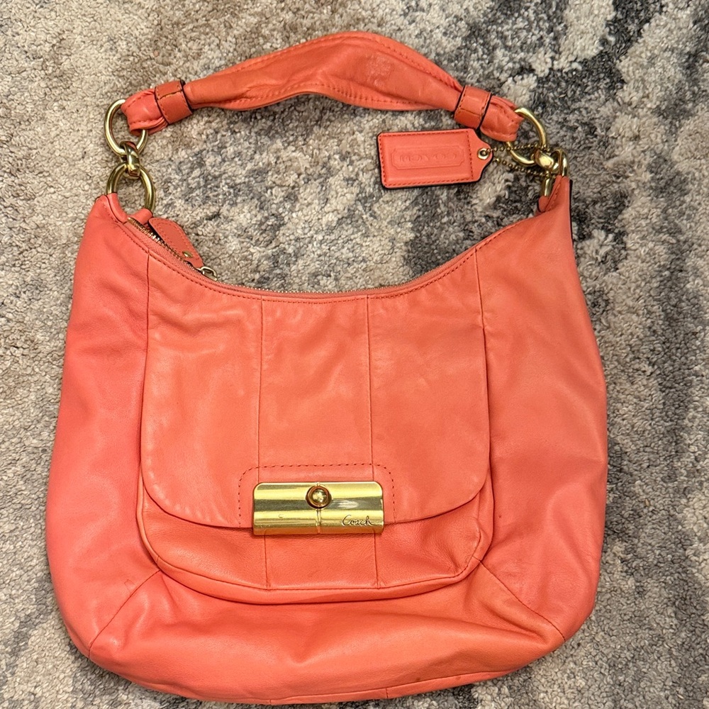 Coach Orange Leather Hobo Bag with Gold Accents